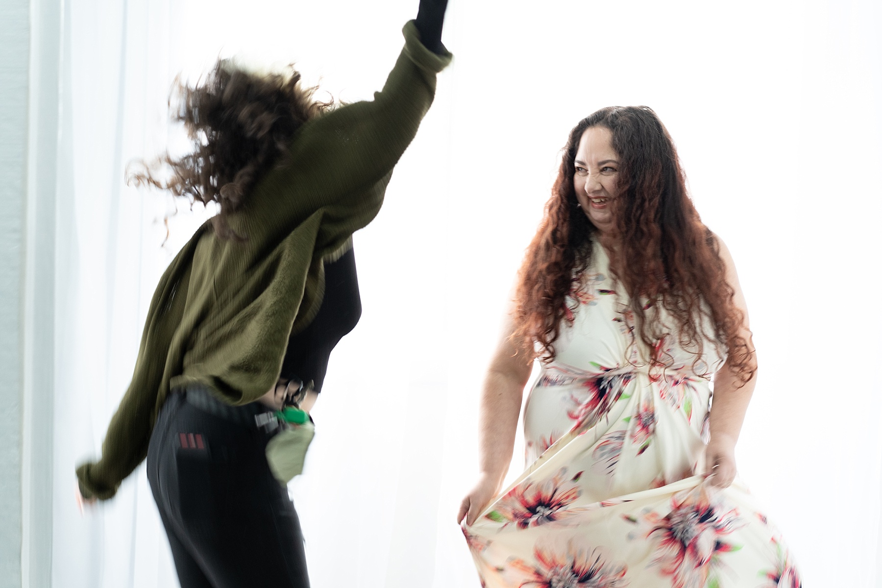 photo of women dancing during a photoshoot to celebrate women over the age of 50